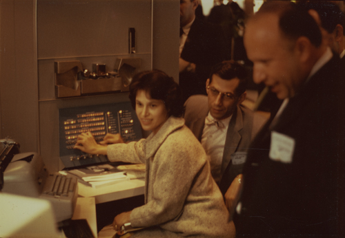People playing Spacewar! at the PDP-1 console, ca 1964