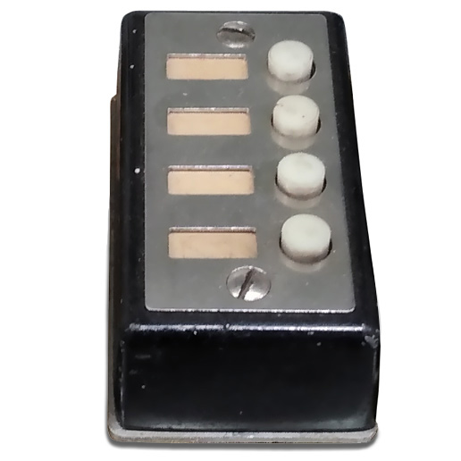 Black 4-button telephone switch box.